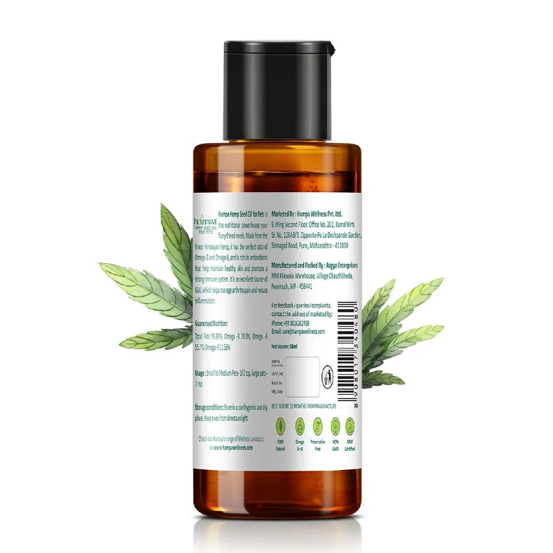 Brown bottle with a label and green leaves on a white background