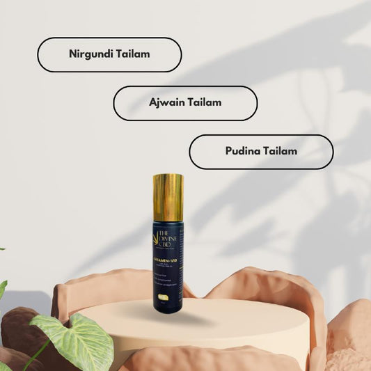 A bottle of The Divine CBD (CATAMEN-V10) from Paarmi Cares on a pedestal with labels reading Nirgundi Tailam, Ajwain Tailam, and Pudina Tailam.