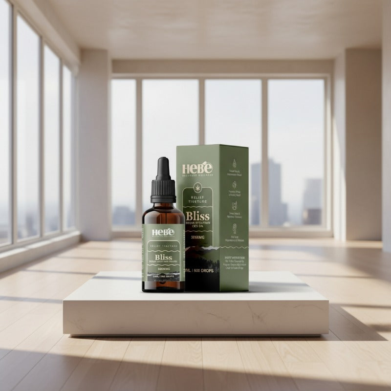 Hebe Bliss CBD Oil bottle and packaging on a platform in a modern room with large windows.