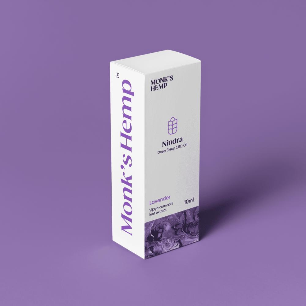 White box of Monk's Hemp Nindra Deep Sleep CBD Oil against a lavender background.