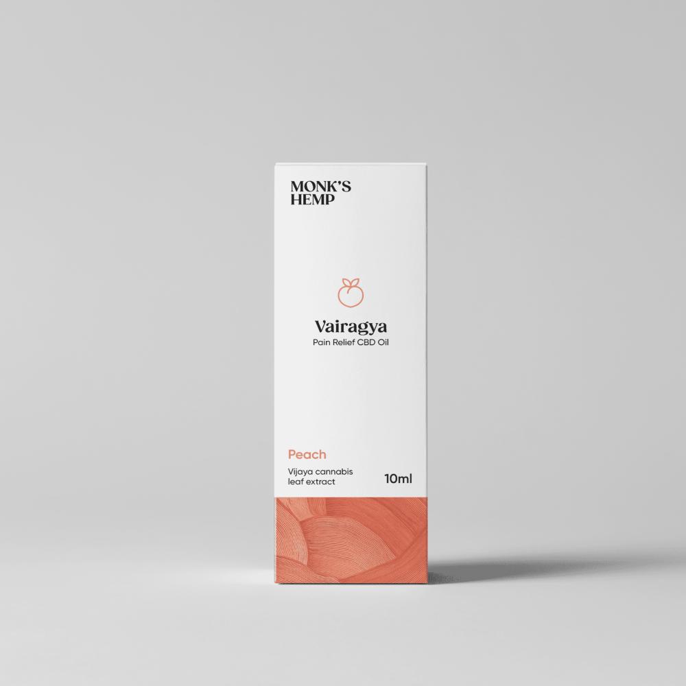 White box of Vairagya Pain Relief CBD Oil by MONK'S HEMP, with peach-color design at the bottom.