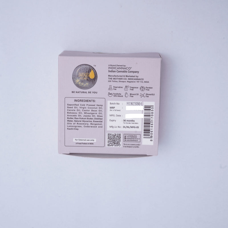 Product packaging with branding and ingredient list on a light gray background