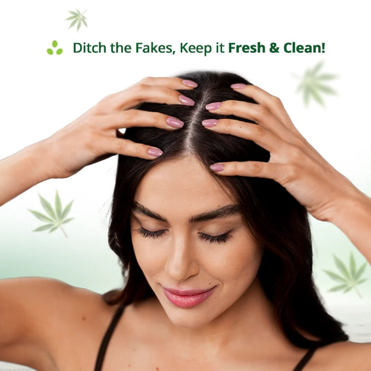 Woman with hands on head against a light green background with cannabis leaves, promoting freshness and cleanliness.