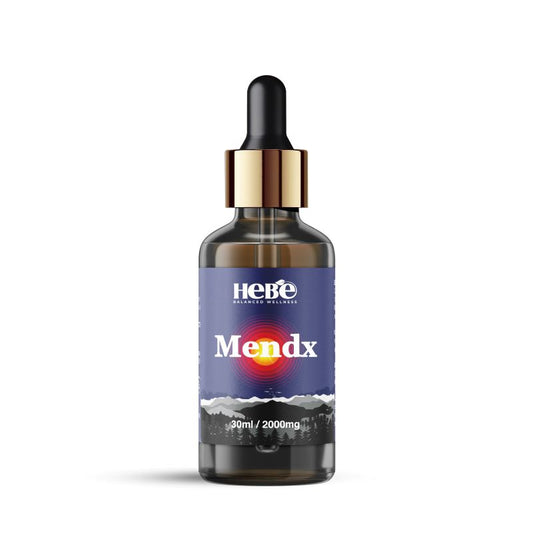 Hebe Wellness 30ml CBD oil bottle labeled Mendx with a blue label and sunset graphic.