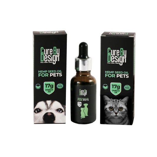 Cure By Design Hemp Seed Oil for Pets with a dropper bottle and packaging on a white background