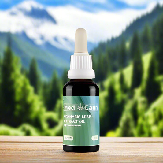 Amber glass bottle with dropper cap, labeled MediCann Cannabis Leaf Extract Oil, 6000MG with Peppermint Flavor.