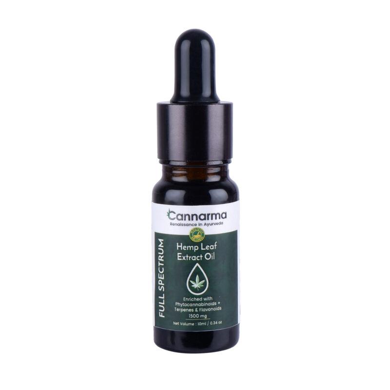 A small brown bottle with a black dropper cap labeled "Cannarma Full Spectrum Hemp Leaf Extract Oil." The label mentions it is enriched with Phytocannabinoids, Terpenes, and Flavonoids, 1500 mg. Embrace the natural wellness and healing power of hemp. The bottle is placed against a white background.