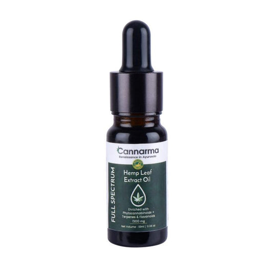 A small brown bottle with a black dropper cap labeled "Cannarma Full Spectrum Hemp Leaf Extract Oil." The label mentions it is enriched with Phytocannabinoids, Terpenes, and Flavonoids, 1500 mg. Embrace the natural wellness and healing power of hemp. The bottle is placed against a white background.