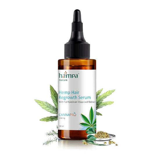 Hampa Hemp Hair Regrowth Serum bottle with cannabis leaves on a white background