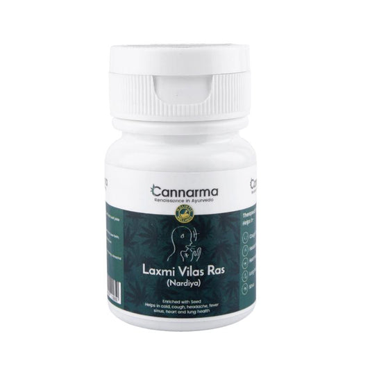 White bottle labeled "Laxmi Vilas Ras (Nardiya)" from Cannarma with hemp leaves and seeds.