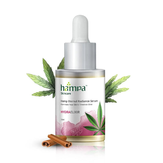 Hampa Skincare Hemp Eternal Radiance Serum bottle with cannabis leaves and cinnamon sticks on a white background