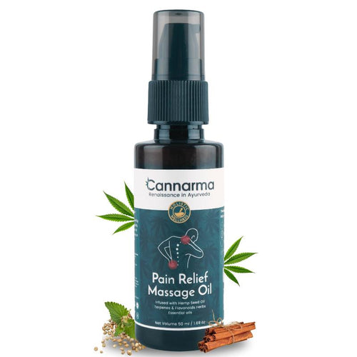 Brown bottle of Cannarma Pain Relief Massage Oil with cannabis leaves and hemp seeds.