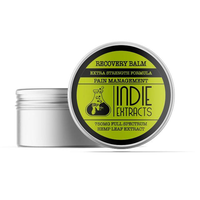 "Silver tin with a lid labeled Indie Extracts CBD Recovery Balm."

