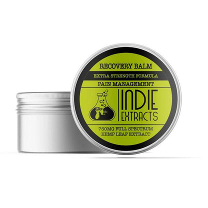"Silver tin with a lid labeled Indie Extracts CBD Recovery Balm."

