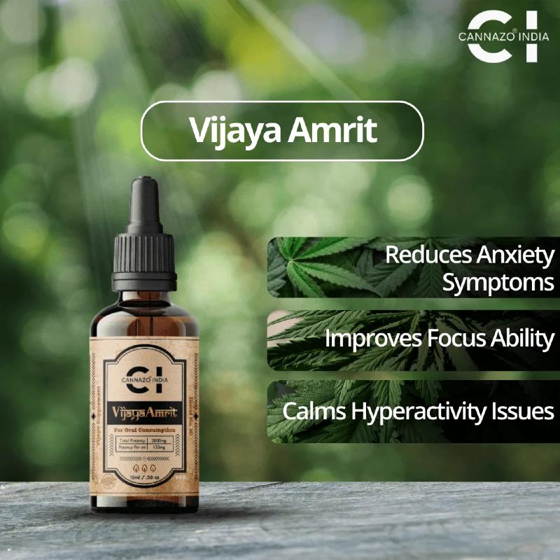 Vijaya Amrit CBD Oil bottle with cannabis leaves on a blurred green background