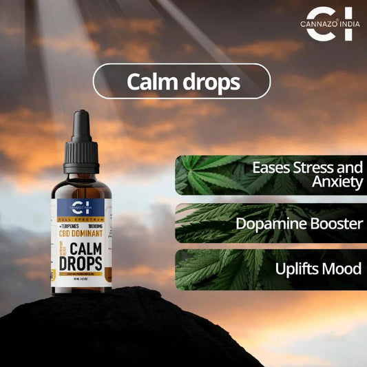 Cannazo India Cannabis product labeled 'Calm Drops' with features on a sunset background