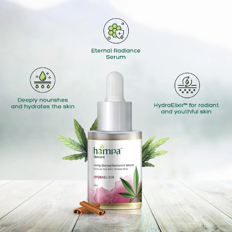 Hampa Skincare Eternal Radiance Serum bottle with green leaves on a light gray background