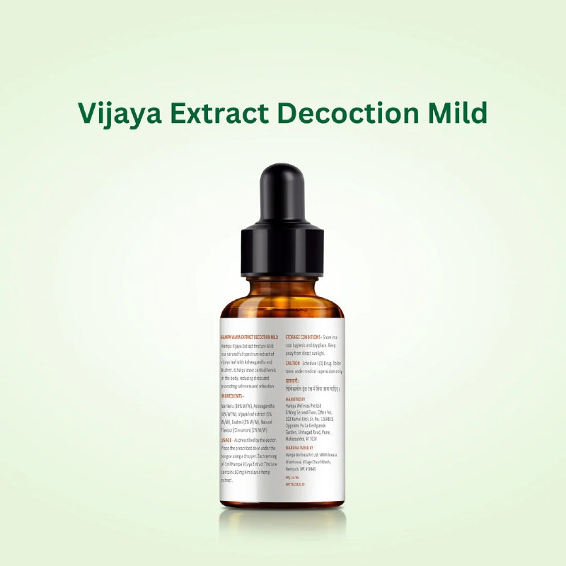 Vijaya Extract Oil Mild bottle with dropper on a light green background