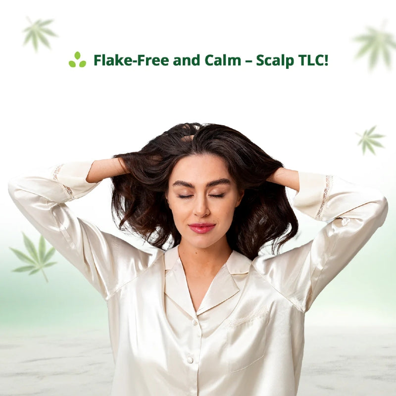Woman with long dark hair wearing a white satin shirt, with text 'Flake-Free and Calm - Scalp TLC' above her.