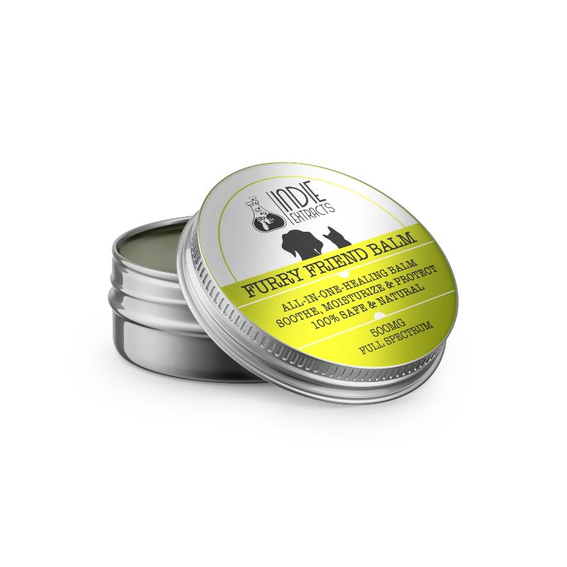 A small tin of Indie Extracts Pet CBD Balm with a slightly open lid.