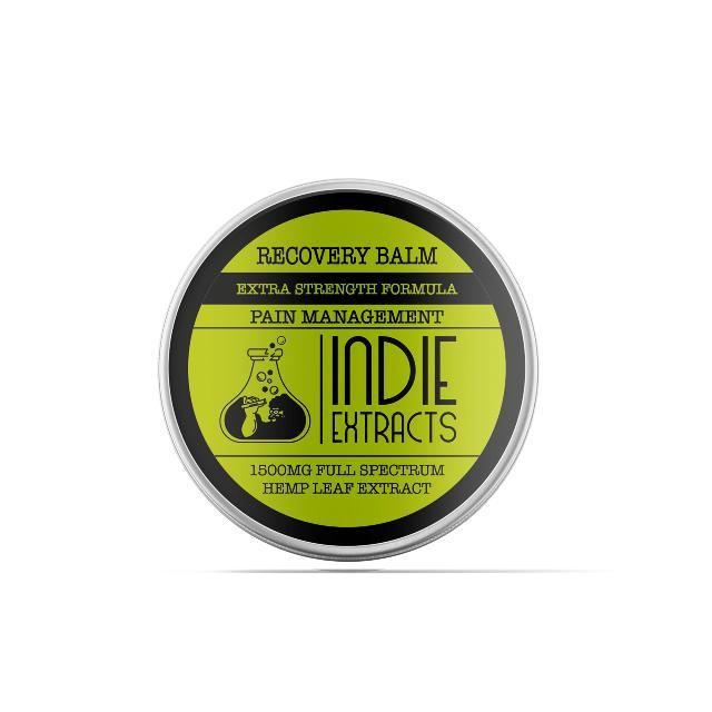 Indie Extracts Recovery Balm tin container with green label reading 'Recovery Balm, Extra Strength Formula, Pain Management, Indie Extracts, 1500mg Full Spectrum Hemp Leaf Extract.