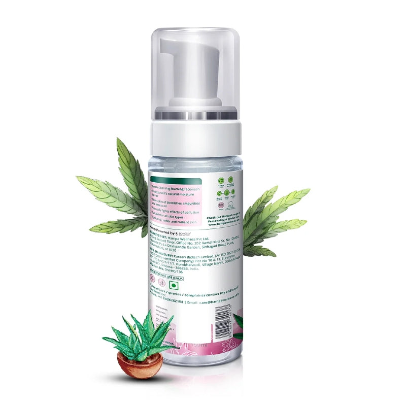Foam spray bottle with cannabis leaves and a small plant on a white background