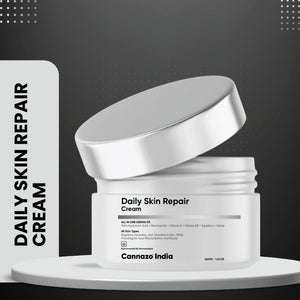 Cananzo CBD Daily Skin Repair Cream jar with open lid on a gray background