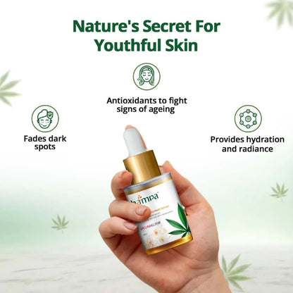 Hand holding a skincare Hemp serum bottle with text about its benefits on a green background