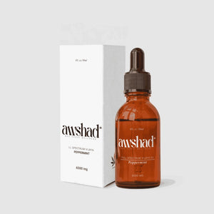 Awshad full-spectrum CBD oil tincture bottle with dropper and packaging on a white background