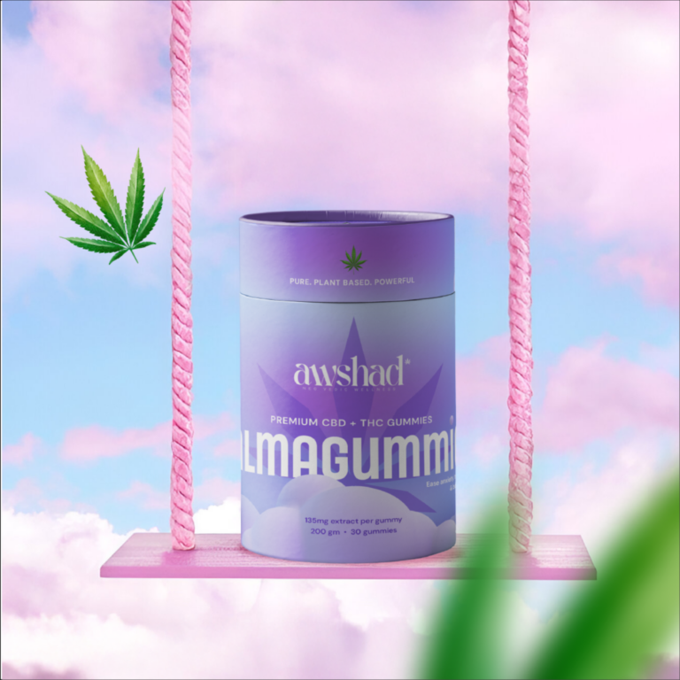 A purple cylindrical container of awshad cbd thc cannabis gummies against a pastel sky with clouds and a green cannabis leaf.