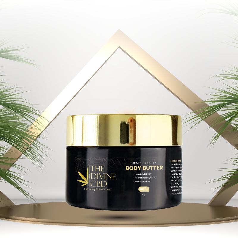 Black jar of "The Divine CBD" hemp-infused body butter with a gold lid, surrounded by golden lines and palm leaves.