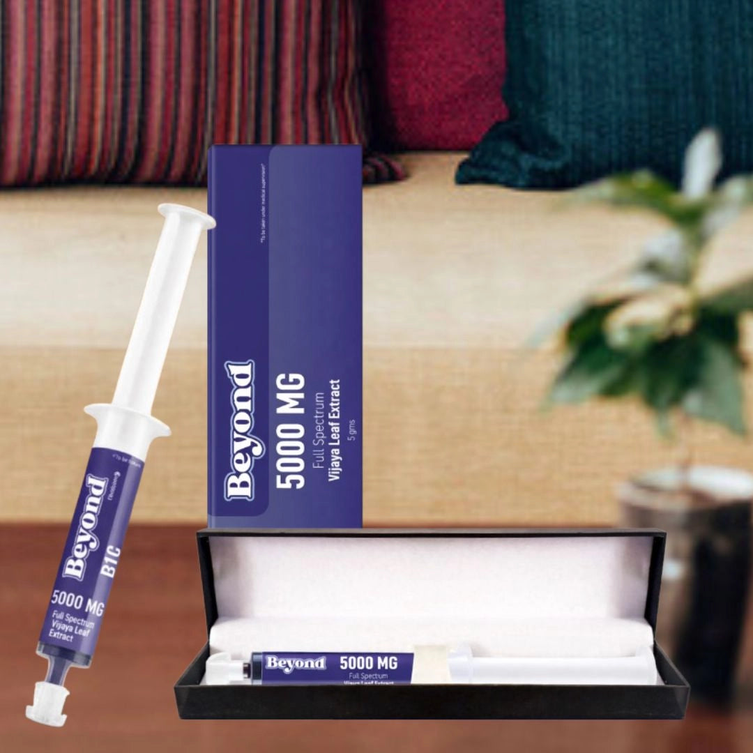 Beyond 5000 MG supplement packaging with syringe on a table.