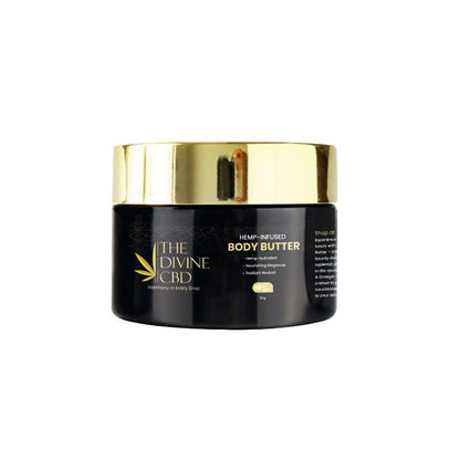 A black container with a gold lid labeled "Hemp-Infused Body Butter" from The Divine CBD.


