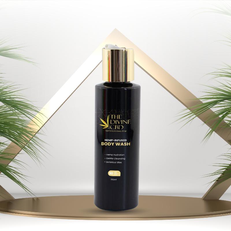 Black bottle of The Divine CBD Hemp-Infused Body Wash with gold cap.

