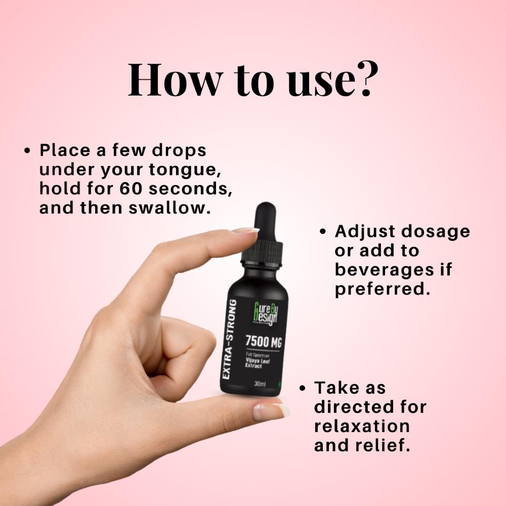 Hand holding a bottle of Cure By Design CBD product with usage instructions on a pink background