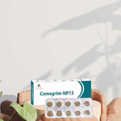  Box of Camegrim-NP13 medication with a blister pack of ten tablets in front, and plant leaves on the side.