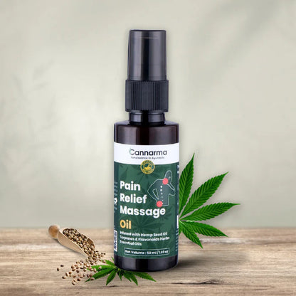 Brown bottle of Cannarma Pain Relief Massage Oil with cannabis leaves and hemp seeds.