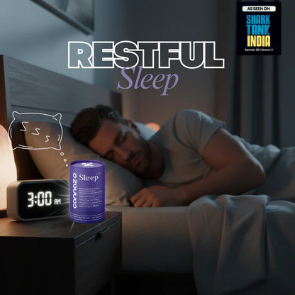 A man sleeping in bed next to a bedside table with a digital alarm clock and a purple cylindrical sleep device labeled 'CANNAZO Sleep'. Large text reads 'RESTFUL Sleep' and a 'AS SEEN ON Shark Tank India' badge appears in the top right.