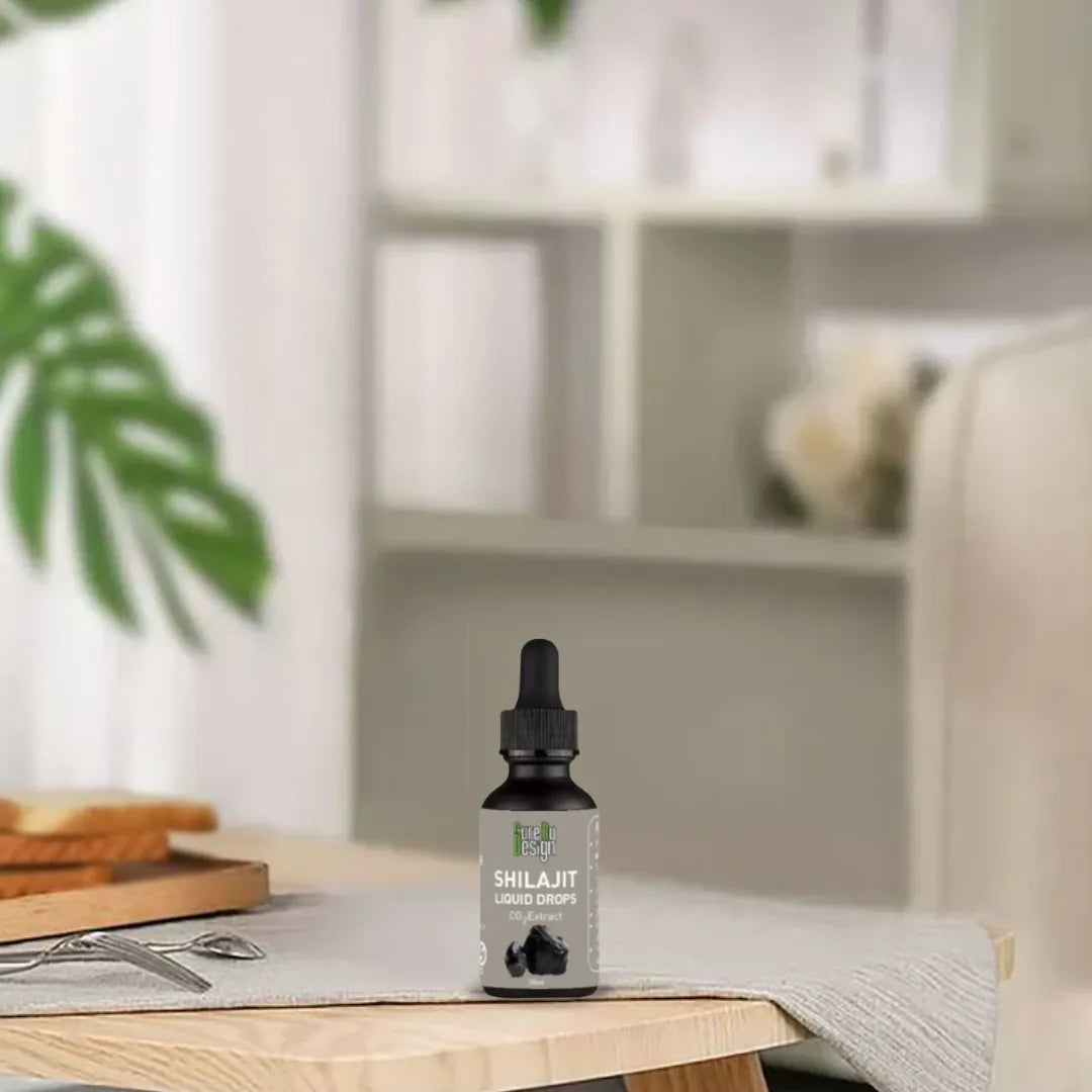 Bottle of Shilajit liquid drops on a table with a blurred indoor background
