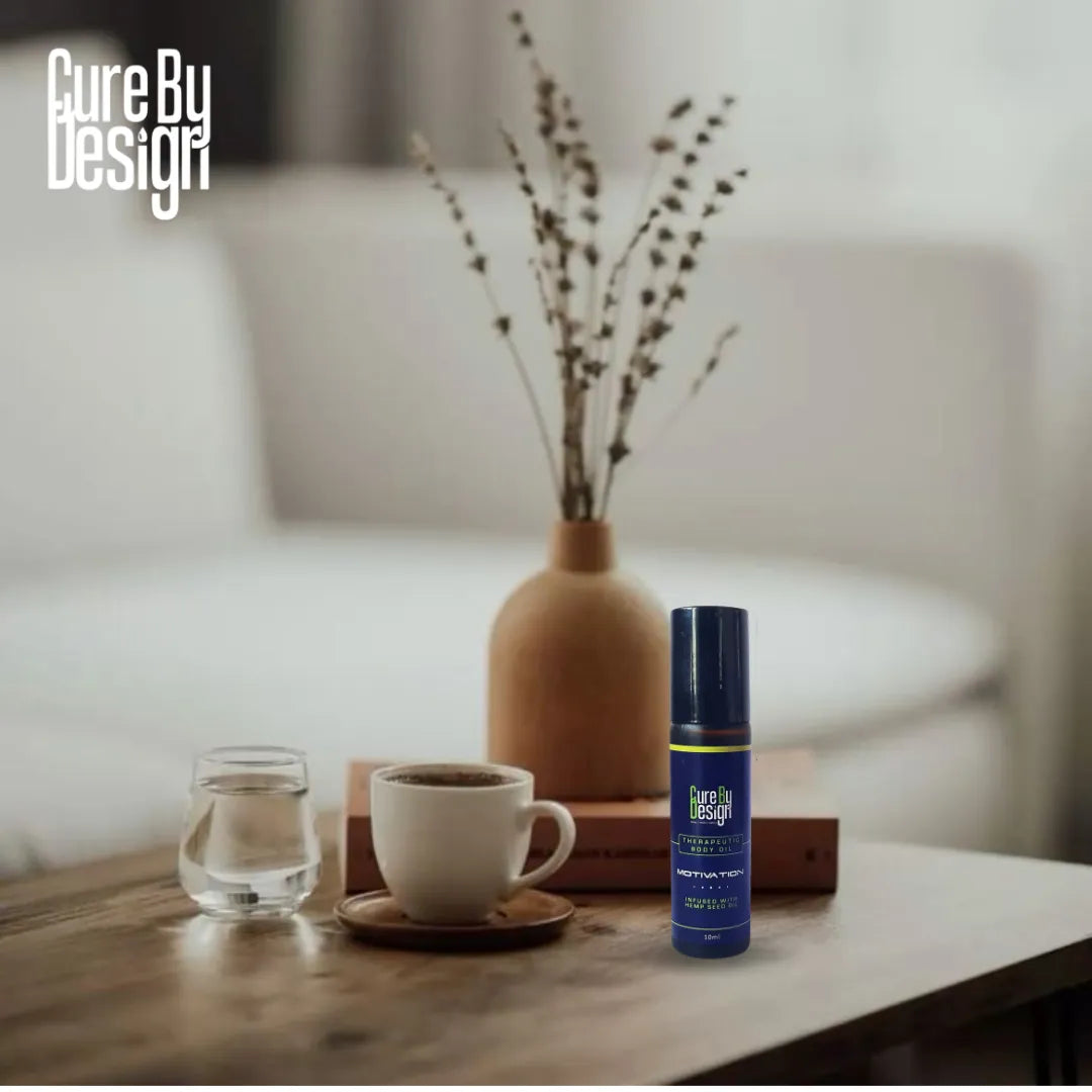 Cure By Design product on a table with a cup, glass, and vase in the background