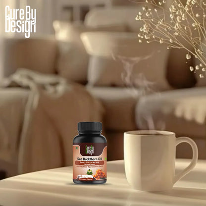 Cure By Design Sea Buckthorn Oil bottle on a table with a blurred background of a cozy living room.