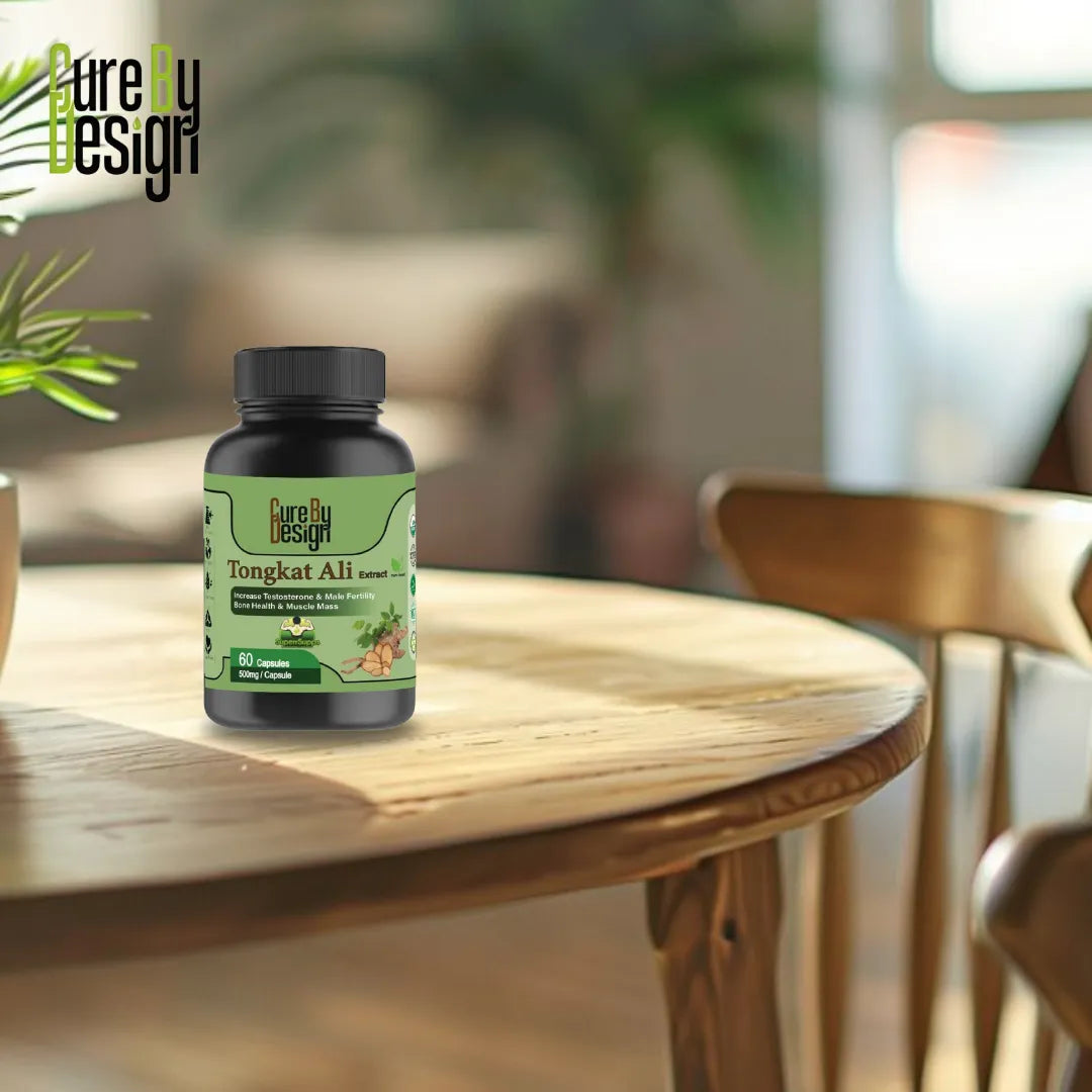 Tongkat Ali supplement bottle on a wooden table with a blurred indoor background