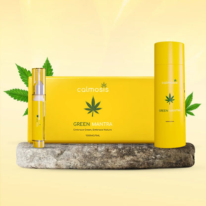 Yellow Calmosis Green Mantra CBD product set with packaging and leaves on a light yellow background