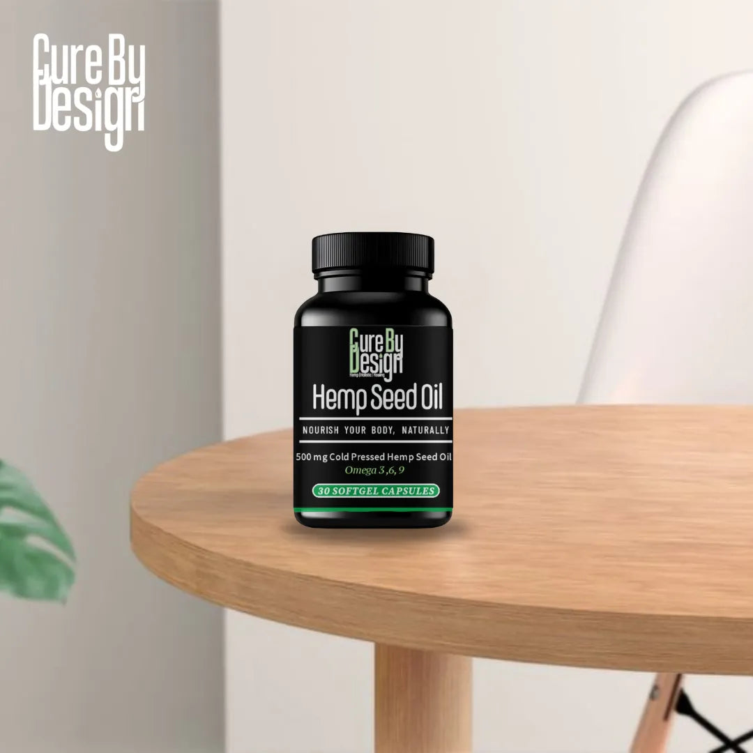 Bottle of Cure By Design Hemp Seed Oil on a wooden table with a neutral background