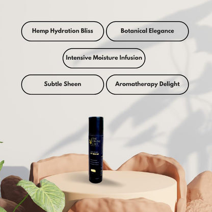 Black cylindrical lip balm on a beige pedestal, with text boxes above it.

