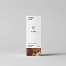 Load image into Gallery viewer, Rectangular white packaging for Karm Improved Focus CBD Oil with coffee flavor, by MONK&#39;S HEMP.
