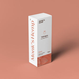 White box on a peach background with Monk's Hemp CBD oil branding in peach text.