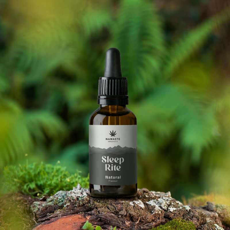 Bottle of Namaste Naturals  Full spectrum CBD Oil Sleep Rite tincture on a natural background
