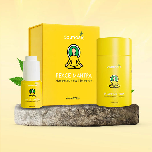 Yellow 'Peace Mantra' CBD product packaging with 'calmosis' branding on a light yellow background.