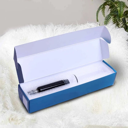 Blue box with a Medical Cannabis Extract inside on a white surface with a plant in the background